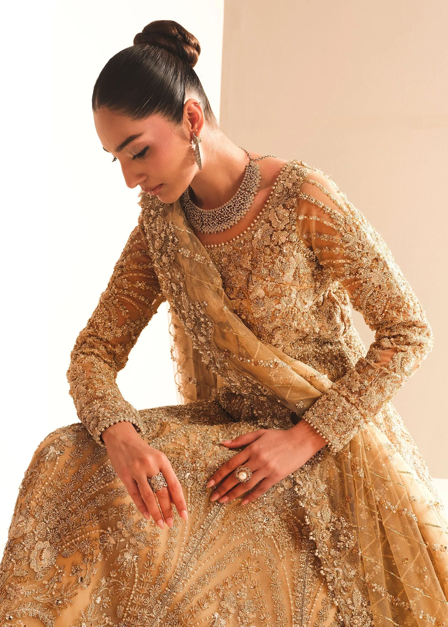 Gold Pakistani Bridal Dress in Gown and Lehenga Style