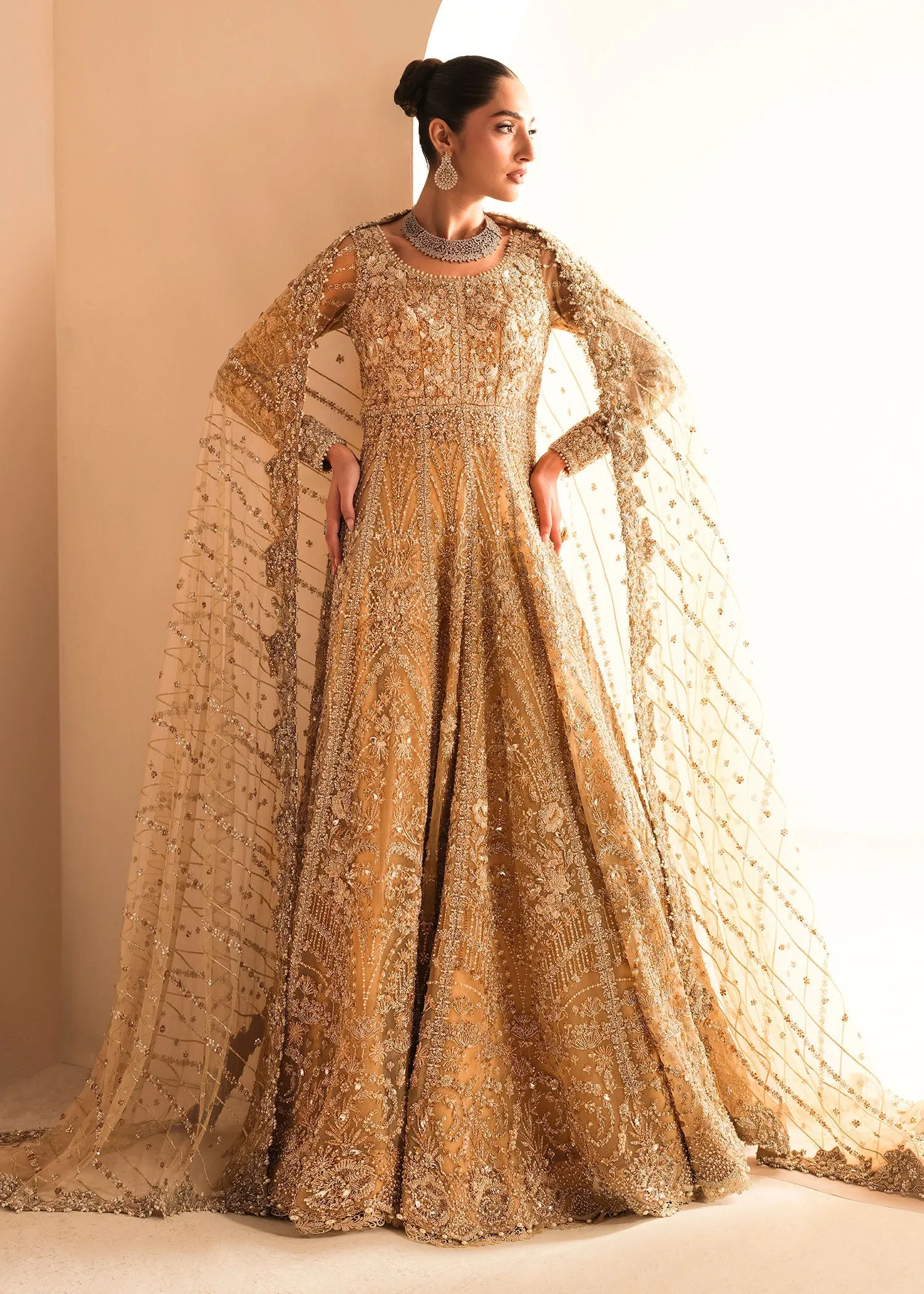Gold Pakistani Bridal Dress in Gown and Lehenga Style