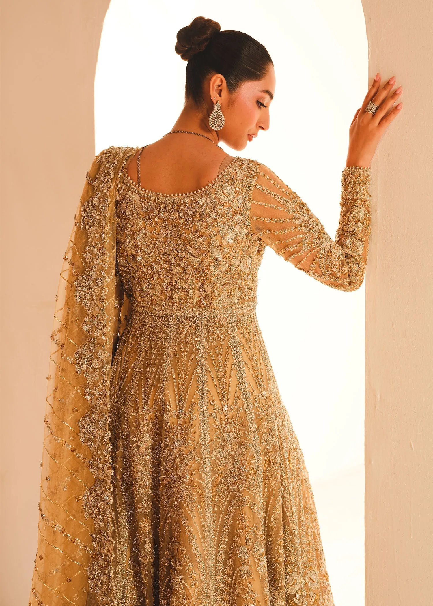 Gold Pakistani Bridal Dress in Gown and Lehenga Style
