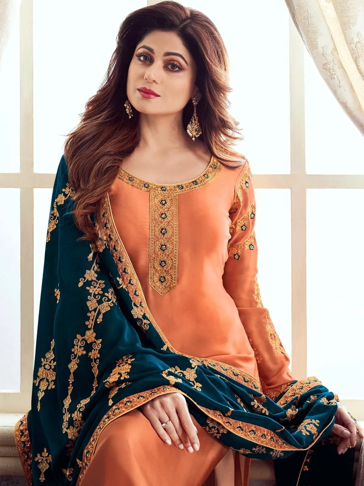 Orange And Blue Ethnic Embroidered Churidar Suit