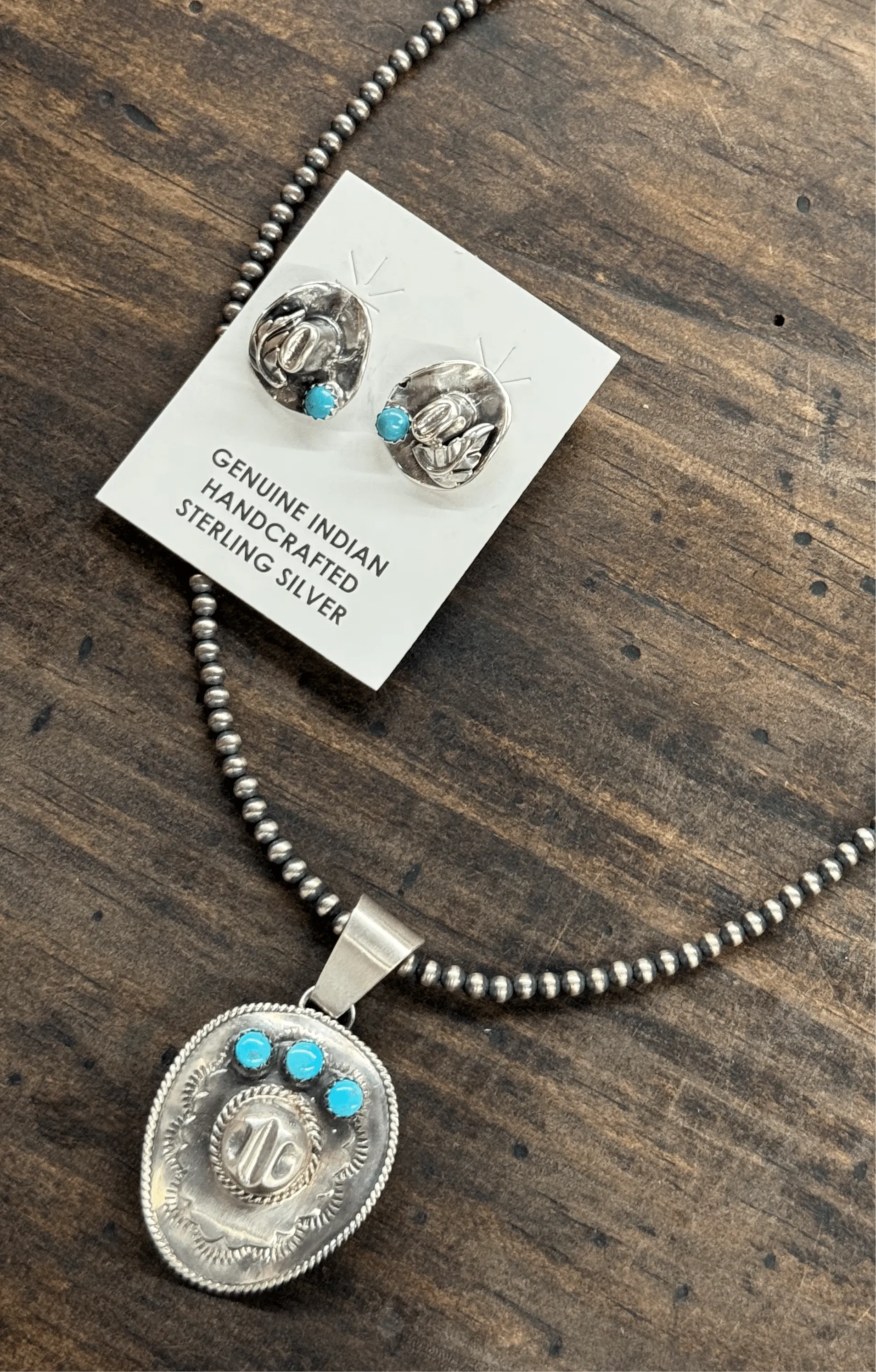 SILVER COWBOY HAT W/ TURQUOISE PENDANT