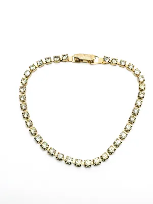 Single row simple clear gold toned vintage rhinestone tennis bracelet