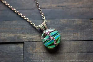 Stripes of Green and Blue Fused Glass and Copper Wire Wrapped Tree of Life Pendant