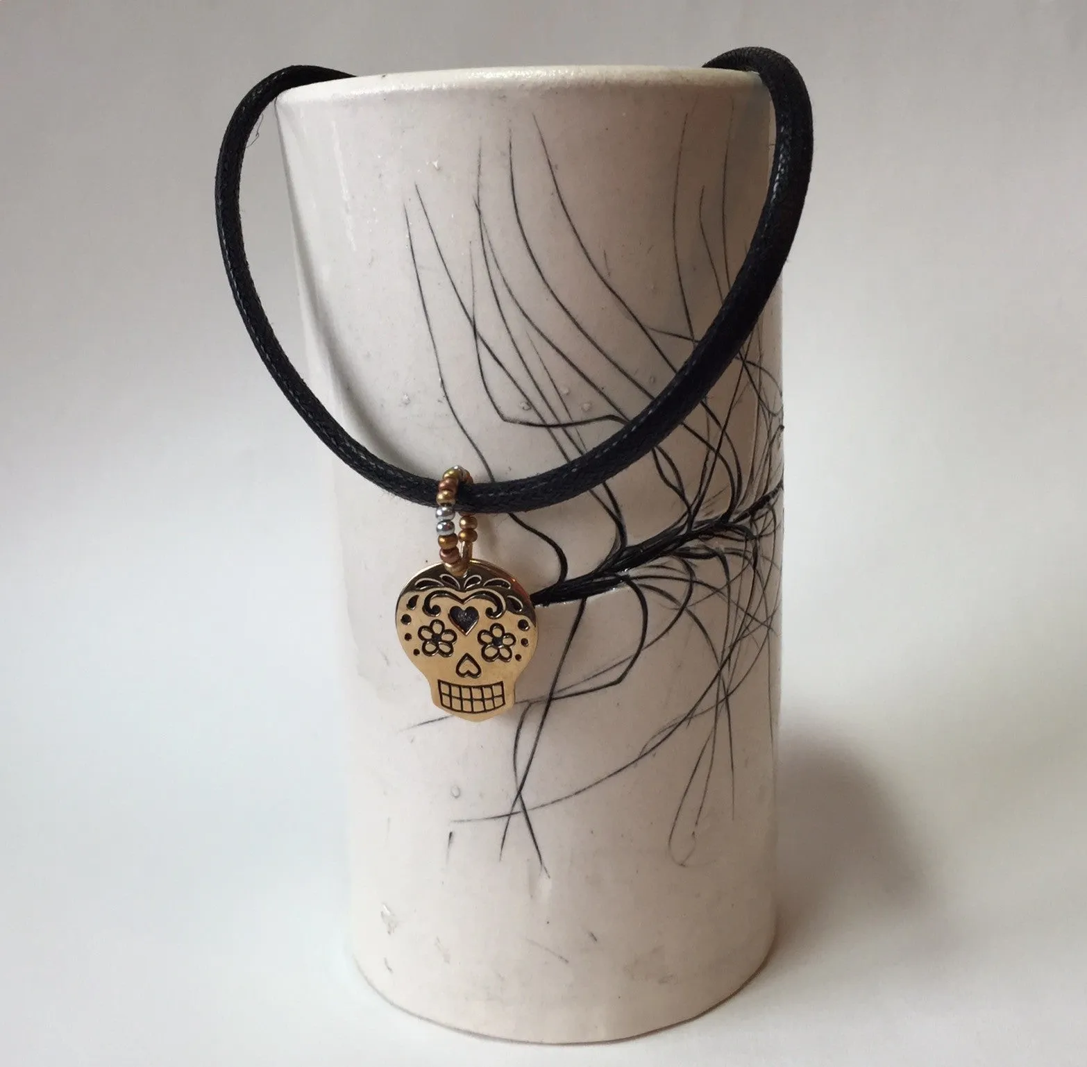 Sugar skull pendant on cord necklace for men or women