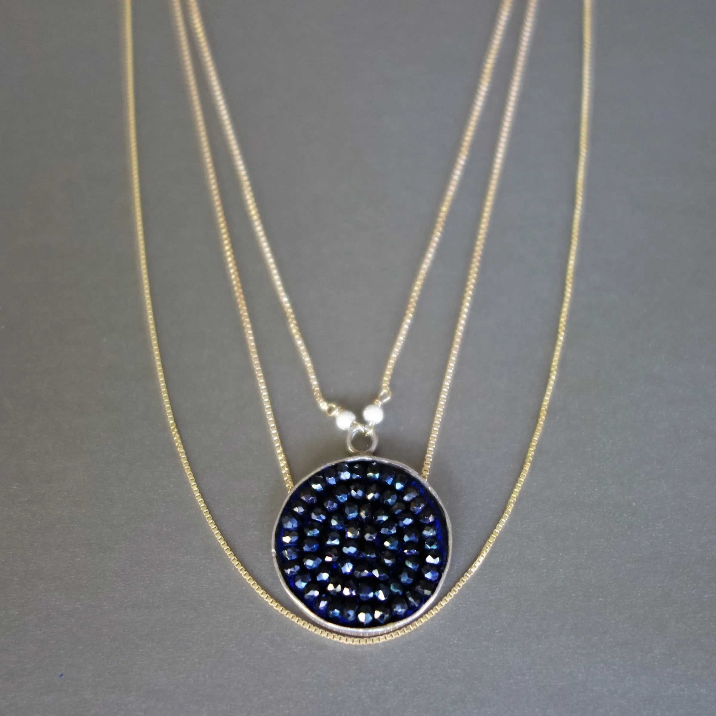Triple Strand Gold and Blue Sapphire necklace
